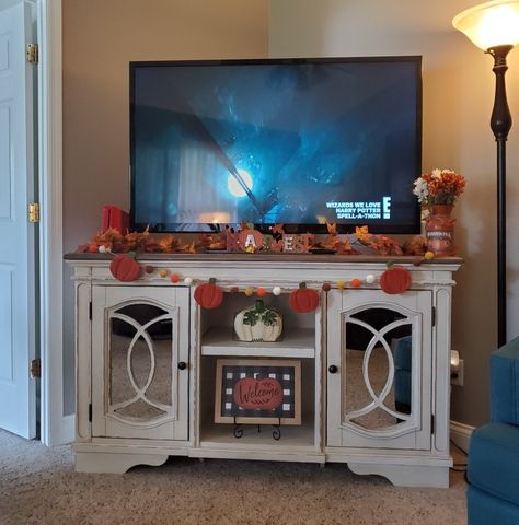 Fall Garland Tv Stand, Tv Entertainment Center Fall Decor, Fall Decor For Tv Stand, Garland On Tv Stand, Fall Tv Console Decor, Tv Stand Fall Decor, Fall Entertainment Center Decor, Tv Stand Fall Decor Ideas, Fall Decor Tv Stand