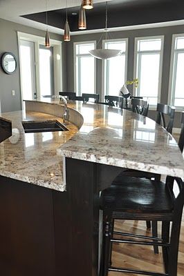 curved bar: but swap the sink for the stove :) Diamond Island Kitchen, Curved Kitchen Island With Sink, Two Level Island With Seating, Kitchen Bar Island Ideas, 2 Tier Kitchen Island With Seating, 2 Level Kitchen Island, Two Level Kitchen Island, Two Tier Kitchen Island, Curved Bar Counter