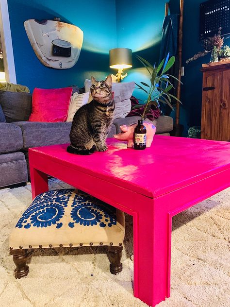 Wooden coffee table spray painted magenta. Modern Painted Coffee Table, Coffee Table Paint Ideas Colorful, Funky Painted Coffee Table, Funky Coffee Table Diy, Hot Pink Coffee Table, Purple Coffee Table, Funky Coffee Table, Eclectic Coffee Table, Funky Coffee Tables