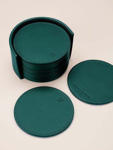 The Studio Collection offers a sculptural case of 12 double-sided leather coasters. The perfect adornment for any coffee table, these coasters are available in a range of Paradise Row colors. Made from the finest vegetable tanned leather, these coasters can be easily wiped clean with a damp cloth and will age beautifully over time. Applying a small amount of beeswax from time to time will form a waterproof layer around your coasters, enhancing the appearance and increasing the longevity of your Leather Photography, Petroleum Blue, Leather Coaster, Leather Coasters, Coaster Design, Table Cafe, Aging Beautifully, Midnight Black, Double Face