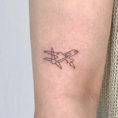 Minimalist Tribute Tattoo, Geometric Airplane Tattoo, Paper Airplane Tattoo Small, Minimal Airplane Tattoo, One Line Plane Tattoo, Travel Tattoo Aesthetic, Small Airplane Tattoos For Women, Schematic Tattoo Ideas, Dainty Airplane Tattoo