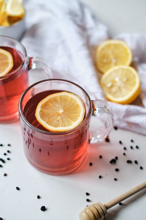 two cups of elderberry tea with lemon slices Elderberry Tea Recipe, Reheat Pizza In Air Fryer, How To Reheat Pizza, Reheating Pizza, Pizza Air Fryer, Pizza In Air Fryer, Dried Elderberries, Elderberry Tea, Homemade Elderberry