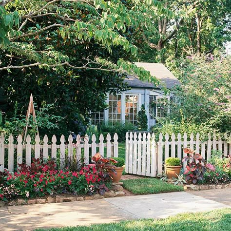 This charming home, with a shrub-filled front yard, felt a little bland, so the homeowners added curb appeal with a simple garden between their fence and sidewalk: http://www.bhg.com/gardening/landscaping-projects/landscape-basics/sidewalk-garden-front-yard/?socsrc=bhgpin030414splashofcolor&page=14 Landscape Shrubs Front Yard, Picket Fence Garden, Landscape Ideas Front Yard Curb Appeal, Landscaping Shrubs, Front Yards Curb Appeal, Southport Nc, Picket Fences, Fence Garden, Front Yard Fence