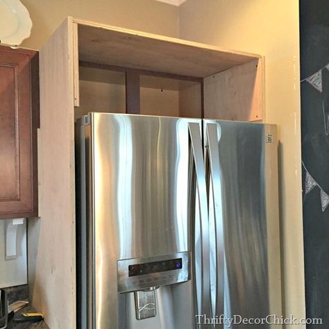 Building in a Fridge With Cabinet on top from Thrifty Decor Chick Cabinet Surround Refrigerator, How To Build Cabinet Above Fridge, Over The Refrigerator Cabinet Ideas, Over Fridge Storage, Fridge Enclosure, Apartment Fridge, Above Fridge Storage, Above Fridge Cabinet, Maine Kitchen