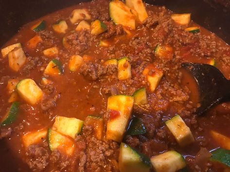 Goulash   3 servings   Each serving provides ( about 1 1/2 cups)  1 lean  3 greens  2 condiments   18 oz. raw ground beef 1/2 cup yellow onion, diced 2 cloves garlic, minced 2 1/4 cups Rao’s Marinara 1 beef broth cube then add water to make 1 cup 9.95 oz.  zucchini, chopped 1 tablespoon soy sauce 1 tablespoon Italian seasoning Instructions Add the ground beef, onion, and garlic to a pot and brown over medium heat, breaking the meat up as it cooks. When beef is cooked through, drain the fat and r Lean And Green, Green Meals, Green Recipes, Lean And Green Meals, Goulash, Greens Recipe, Beef Broth, Yellow Onion, Italian Seasoning