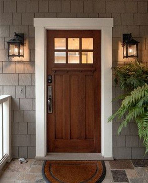 Boosting your home's curb appeal isn't just something you should do when you're getting ready to sell. You live there now, so why not make sure it's not only pleasing to your eye, but to anyone else who happens to be passing by? Craftsman Exterior Door, Craftsman Front Door, Brown Front Doors, Front Door Lighting, Traditional Front Doors, Metal Front Door, Doors Wooden, Farmhouse Front Door, Craftsman Exterior