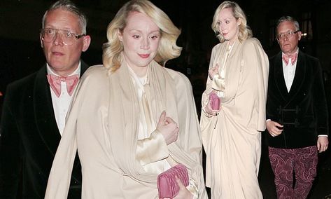 Gwendoline Christie looks effortlessly elegant on rare public outing with beau Giles Deacon Gwendoline Christie Giles Deacon, Gwendoline Christie And Giles Deacon, Gold Chiffon Dress, Gwen Christie, Chris Hughes, Giles Deacon, Gwendoline Christie, Charity Gala, Cheltenham Festival