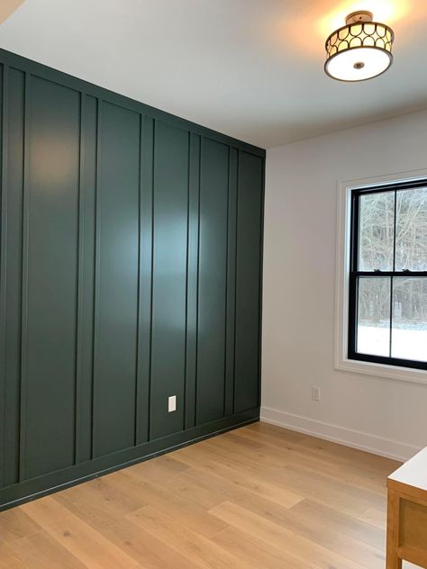 Board And Batten Dark Wall, Board And Batten Upper Half Wall, Vertical Moulding Accent Wall, Dark Green Batten Board, Office Accent Wall With Window, Media Room Accent Wall, Wood Trim Wall Design, Dark Blue Board And Batten Wall, Vertical Trim Accent Wall