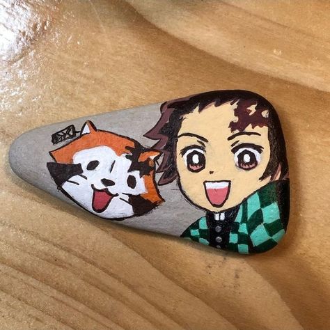 Demon Slayer: Kimetsu no Yaiba Tanjirou and Rascal painted rock~.~ Anime Rock Painting, Painted Rocks Kids, Beautiful Stones, Demon Slayer Kimetsu No Yaiba, Painted Rock, Kimetsu No Yaiba, Rock Painting, Stone Painting, Demon Slayer