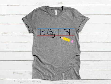 F Lettering, Friyay Shirt, Handwriting Lines, Toddler Teacher, Teaching Outfits, Teaching Shirts, Teacher Style, It's Friday, Kindness Shirts