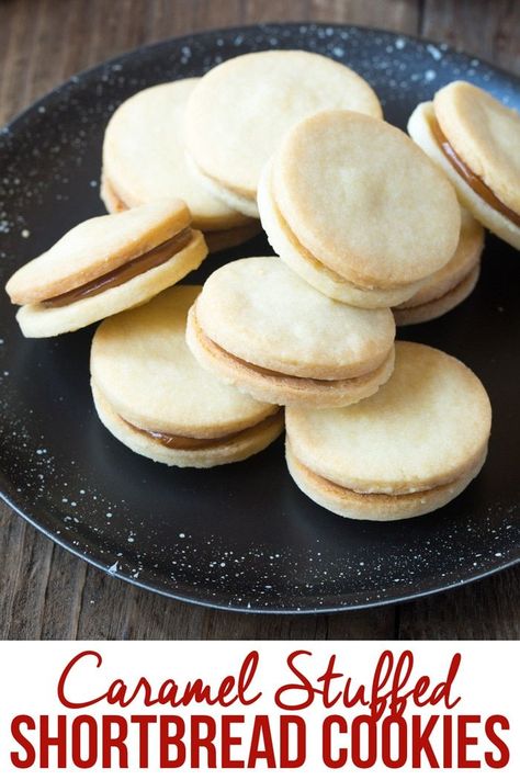 Caramel Shortbread Recipe - Crisp and decadent caramel stuffed shortbread sandwich cookies, made from the perfect butter cut-out cookie recipe!  #ASpicyPerspective #cookies #christmas #saltedcaramel via @spicyperspectiv Caramel Shortbread, Cut Out Cookie Recipe, Shortbread Recipe, Shortbread Cookie Recipe, Shortbread Recipes, Shortbread Cookie, Cookies Christmas, Cut Out Cookies, Sandwich Cookies