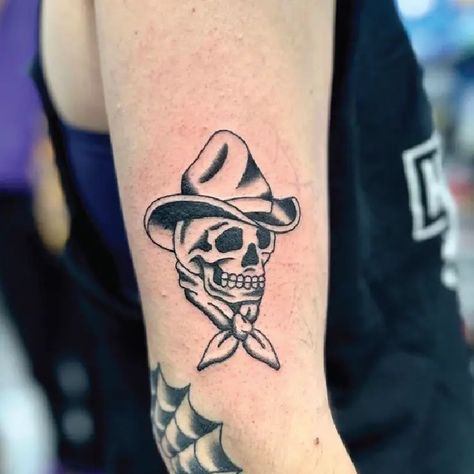 New Tribe Tattoo & Piercing | Toronto Tattoo Shop Skull In Cowboy Hat Tattoo, Cowboy Head Tattoo, Skull Cowboy Hat Tattoo, Cowboy Skull Tattoo Traditional, Skull Tattoo Women, Cowboy Traditional Tattoo, Side Of Leg Tattoo, Western Skull Tattoo, Pirate Hat Tattoo