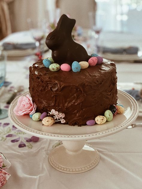 For this year’s easter I decided to make my mom’s most scrumptious chocolate cake. After finding some great easter decor inspo here on Pinterest, I simply decorated it with a dark chocolate Lindt bunny, some speckled chocolate eggs as well as some articifial flowers. Watch the baking process on my IG (stefii_vee)  at the link! Lindt Bunny, Lindt Easter, Chocolate Lindt, Baking Process, Easter Baking, Chocolate Eggs, Easter Decor, My Mom, I Decided