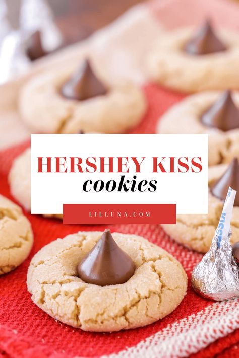 Hershey Kiss cookies are soft, chewy peanut butter cookies topped with a tasty chocolate kiss! It's a best-loved simple cookie recipe. #peanutbuttercookies #kisscookies #cookies #peanutbutter #hersheyskiss Cookies Hershey Kiss, Peanut Butter Hershey Kiss Cookies, Peanut Butter Kiss Cookies Recipe, Soft Chewy Peanut Butter Cookies, Simple Cookie Recipe, Kiss Cookie Recipe, Chocolate Kiss Cookies, Hershey Kiss Cookies, Peanut Butter Kiss