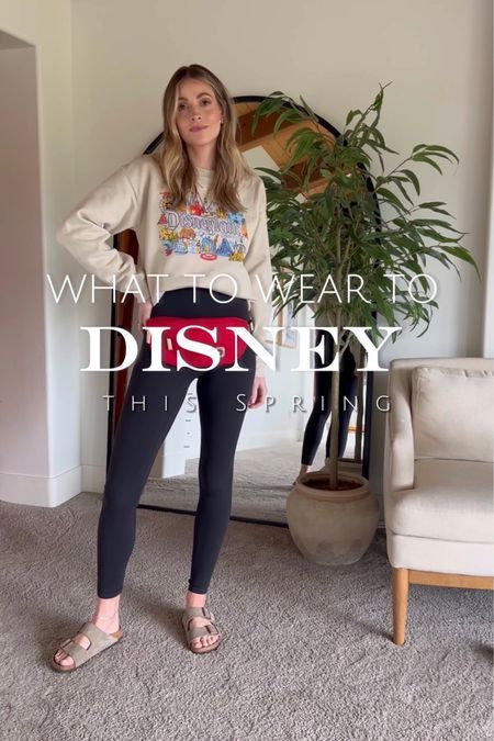 Here I'm sharing some ideas on what to wear to Disneyland if you're going this spring. We went recently and I picked out this comfortable outfit which was perfect! I paired this Disney themed sweatshirt (I linked a bunch of similar ones on my LTK page) with these leggings, Birkenstock sandals, and this belt bag! Let me know what you think! | Disney, mom life, motherhood, day trips, activities, theme parks, comfort, outfits, style, inspiration Athletic Theme Park Outfits, Mom Park Outfit Spring, Disneyland Outfits Women Spring, Comfortable Theme Park Outfit, Mom Disney Outfit Spring, Spring Disneyland Outfits, Disney Leggings Outfit, Leggings Disney Outfit, Disneyland Mom Outfit