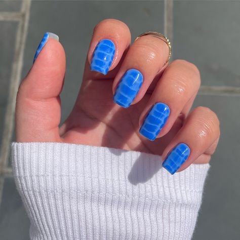 Light blue base with darker brighter blue croc print on top. Blue nails. Shiny nails. White top. Summer nails. Holiday nails. Festival nails. Nail inspo. Nail art. Nail inspiration Blue Croc Print Nails, Blue Crocodile Nails, Blue Croc Nails, Croc Print Nails, Croc Nails, Blooming Gel, Nails Holiday, Print Nails, Nails Blue