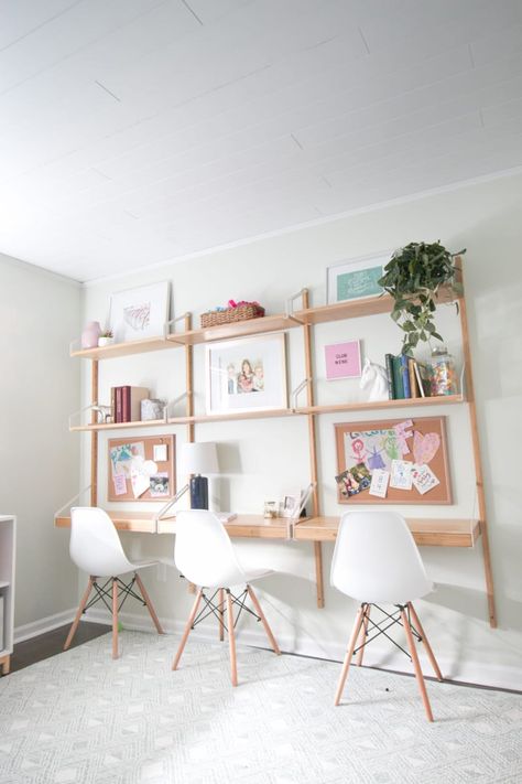 This desk system from Ikea fits this room perfectly and provides storage. Desk For Playroom, Loft School Room, Playroom Desks Homework Station, Playroom With Desks, Kids Wall Desk, Ikea Wall Desk, Homework Station For Kids, Ikea Kids Bedroom, Bright Kids Room