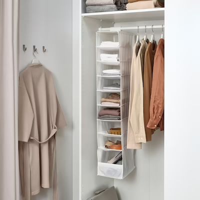 Skubb Ikea Organizers, Skubb Ikea, Hanging Clothes Organizer, Small Apartment Storage, Ceiling Shelves, Ikea Closet, Apartment Storage, Storing Blankets, Space Saving Hangers