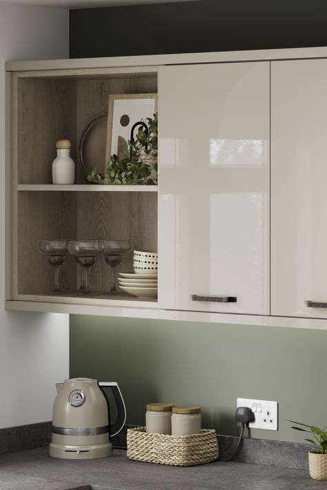 We are loving this Greenwich Gloss Sandstone Kitchen Shelving. Use this stunning modern kitchen design to inspire your cream kitchen ideas. Use natural oak shelving and Oxidised Metal Laminate Worktops to create a modern kitchen design. Finish with your favourite kitchen decor and house plants. Cream Kitchen Decor Ideas, Cream Gloss Kitchen Cabinets, Cream Gloss Kitchen Ideas Wall Colours, Sandstone Kitchen Cabinets, Kitchen Worktop Styling, Cream Kitchen Units What Colour Walls, Cream Gloss Kitchen Ideas, Cream Kitchen Inspiration, Modern Cream Kitchen