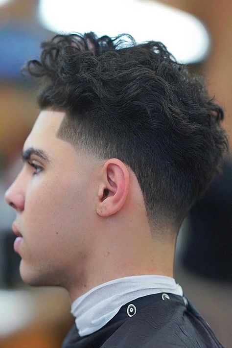 Best Haircuts For Men To Rock In 2020 | MensHaircuts.com Taper Fade Long Hair, High Taper Fade, Low Taper Fade Haircut, Mid Fade Haircut, Taper Fade Curly Hair, Drop Fade Haircut, Low Taper Fade, Fade Haircut Styles, High Fade Haircut