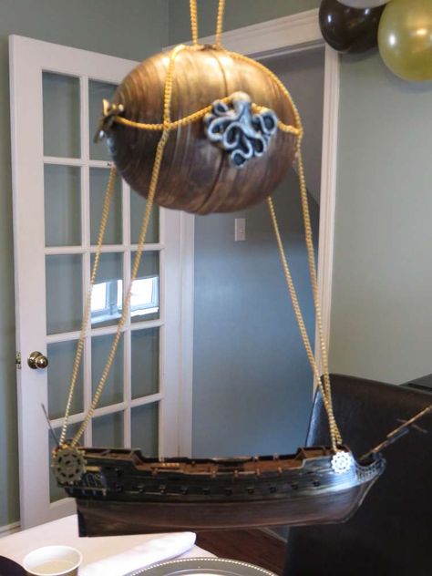 Madelyn's 12th Birthday Party | CatchMyParty.com Steampunk Classroom Decor, Steampunk Party Ideas, Ocean Steampunk, Steampunk Classroom, Steampunk Party Decorations, Punk Birthday, Steampunk Birthday, Auction Decor, Kids Festival