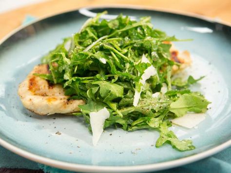 Get Grilled Chicken Paillard with Arugula and Shaved Pecorino Recipe from Food Network Chicken Paillard, Tomato Salad Recipes, Bobby Flay, Health Conscious, Arugula Salad, Chicken Cutlets, Watercress, Grill Master, Tomato Salad