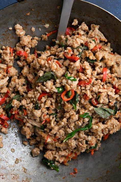 Thai Basil Chicken Recipe (Pad Kra Pao Gai) #thaifood #thaibasilchicken #thaibasil #holybasil #chickenrecipe #groundchicken #stirfryrecipe #easythaifood #homemadethaifood Thai Basil Chicken Recipe, Basil Chicken Recipe, Pao Recipe, Pad Kra Pao, Street Food Thailand, Food Thailand, Foolproof Recipes, Thai Iced Tea, Spicy Noodle