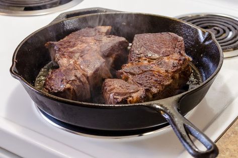 A thick slice of center-cut beef shank looks remarkably like a well-marbled steak, and is often labeled as shank steak in retail stores. They're too tough for grilling, but like chuck steaks, they're ideal for braising. The long, slow cooking process softens the tough muscle fibers and connective tissues, leaving the meat fork-tender with a... Shank Steak, Meat Cooking Temperatures, Beef Shank Recipe, Pork Cooking Temperature, Grilling The Perfect Steak, Steak In Oven, Cooking The Perfect Steak, Ground Beef And Potatoes, Beef Shank