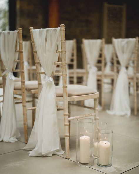 Simple and elegant aisle detailing ✨ @lewis_fackrell_photography @sttewdricshouse @lumieventflowers . . . #wedding #weddingdesign #weddingstylist #eventdesign #weddingdetails #weddingseason #weddingdecor #weddinginspo #weddingvibes #eventinspo #events #southwalesevents #neutralwedding #neutrals #weddingflorals #weddingflowers #weddingday #sttewdrics #aisle #aisledetails #weddingceremony Wedding Chair Draping, Aisle Decorations Wedding Simple, Wedding Aisle Flowers On Chairs, Modern Wedding Aisle Decor, Aisle Chair Decorations Wedding, Simple Wedding Aisle Decor, Neutral Wedding Ceremony, Wedding Aisle Chair Decor, Aisle Chair Decor