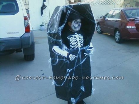 This is Michael in 2nd grade, he was 7 yrs. old at the time. We gathered cardboard and I cut and shaped it to his size using the ideal  of an old fashioned Coffin Out Of Cardboard, Coffin Diy, Walking Skeleton, Cardboard Coffin, Skeleton In Coffin, Eclectic Studio, Purim Costumes, Spooky Spooky, Fun Costumes