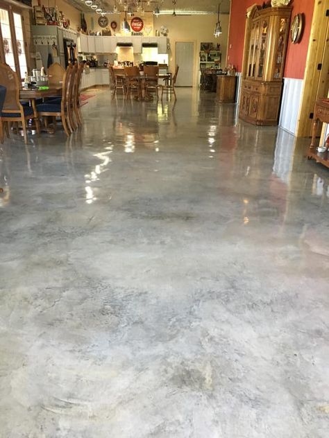 A polished concrete floor. Stained Concrete Floors That Look Like Wood, Concrete Floor Stain Ideas, Clear Epoxy Concrete Floor, Stained Concrete Bathroom Floor, Cement Epoxy Floor, Stained Cement Floors In House, Sherwin Williams Concrete Stain Colors, Stained Concrete Floors Colors, Stained Concrete Floors Basement