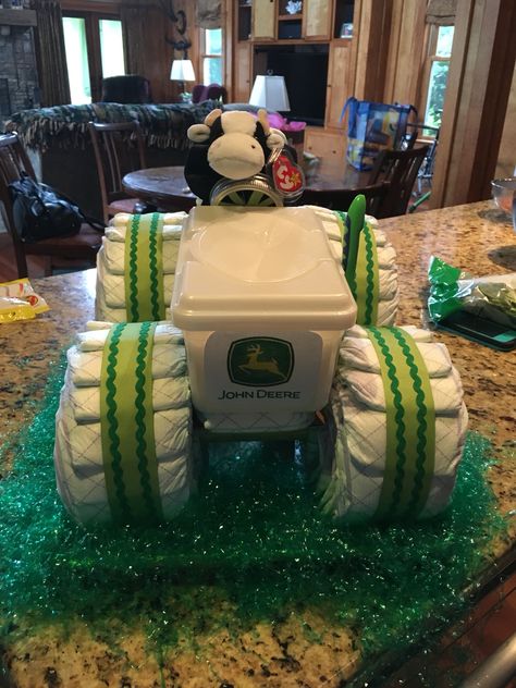 Tractor diaper cake Tractor Diaper Cake, Tiffany Baby Shower Theme, Diaper Cake Ideas, Tractor Baby Shower, Diaper Cakes Tutorial, Diaper Cake Instructions, Campfire Recipes, Diy Diaper Cake