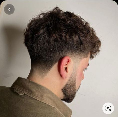 Short Wavy Haircut Men, Low Fade Fluffy Fringe, Mid Taper Fade Haircut Curly, Mens Haircuts Round Face, Fohawk Haircut Fade, Medium Fade Haircut, Mens Haircuts Thick Hair, Low Taper Fade Haircut, Men's Cuts