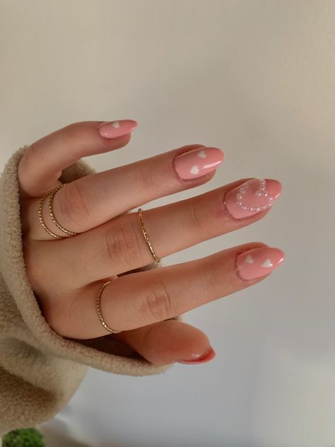 cute pink hearts acrylic gel x pearl hearts baby pink nails valentines day nails Valentines Day Nails With Pearls, Pearl Heart Charm Nails, Pearl Heart Nails, Pink Nails Valentines Day, Pink Nails Valentines, Pink Heart Nails, Nails Valentines Day, Cute Pink Heart, Baby Pink Nails