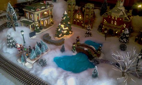 I like this style of stone bridge going over the lazy river Village Miniature, Christmas Tree Village, Lemax Christmas Village, Lemax Christmas, Diy Christmas Village, Christmas In The City, Christmas Village Display, Village Display, Halloween Village