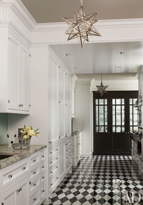 9 Beautiful Black-and-White Kitchens from the AD Archives Photos | Architectural Digest Black And White Checkered Floor, White Kitchen Floor, White Flooring, Checkered Floor, Black White Kitchen, White Kitchen Tiles, White Marble Floor, Kitchen Tiles Design, Chicago Apartment