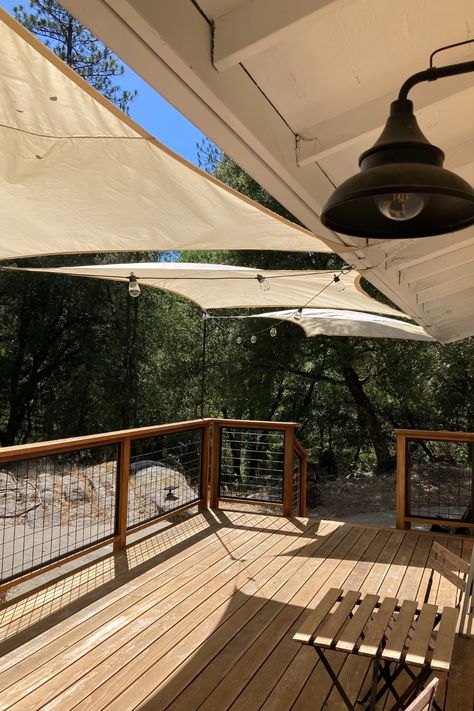 How to DIY low cost and easy to install canopy sail sun shades on a deck or patio. Diy Sail Shade Post, Deck Sun Shade, Front Porch Deck, Deck Shade, Easy Deck, Sun Sails, Deck Or Patio, Deck Canopy, Tiered Deck