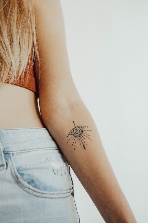 Evil eye Tattoo Small Evil Eye Tattoo Simple, Greek Evil Eye Tattoo, Protection Tattoo, Evil Eye Tattoo, Mother Nature Tattoos, Forearm Tattoo Women, Traditional Tattoo Art, Back Tattoo Women, Tattoo Designs And Meanings