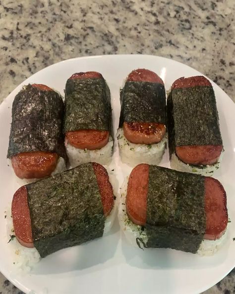 Get a taste of the islands with homemade Spam Musubi! Simple, savory, and so satisfying. 🌺🍙 Spam Musubi Hawaiian Spam Musubi Delight Ingredients: 2 cups uncooked short-grain white rice 2 cups water 1 (12-ounce) can Spam 1/4 cup soy sauce 1/4 cup oyster sauce 1/4 cup white sugar 5 sheets nori (dry seaweed) Furikake (optional) Directions: Rinse the rice under cold water until the water runs clear. Cook the rice with 2 cups of water in a rice cooker or on the stovetop according to package i... Spam Aesthetic Food, Spam Wasabi, Hawaiian Spam Musubi Recipe, Hawaiian Spam Musubi, Homemade Spam, Spam Rice, Spam Musubi Recipe, Musubi Recipe, Spam Musubi