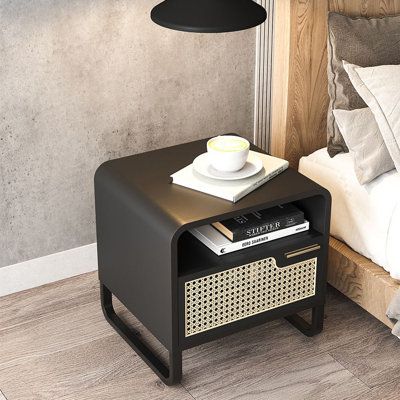 Bringing a sense of Italian minimalist fashion to your home with this nightstand, it effortlessly combines modern elements and vintage styling. The table top is perfect to display a lovely floral arrangement, lamp, or family photo. Boasting one drawer that provides additional storage capacity for organizing books, magazines, knickknacks and other essentials. In addition, crafted from premium rattan, solid wood and metal, this piece looks great and adds function to almost any space. Deck out your Minimalist Nightstand, Black Buffet, Drawer Bedroom, Black Nightstand, White Bedside Table, White Nightstand, Household Furniture, Bedroom Night Stands, Quality Furniture