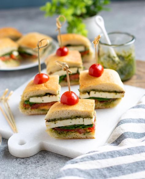 Pesto Caprese Sandwich is an easy vegetarian sandwich recipe for picnics, parties, or potlucks. It features tomatoes, fresh mozzarella, and pesto. #holidayrecipes #partyrecipes #sandwich #vegetarian Tea Party Sandwiches Recipes, Sandwich Shapes, Lemon Butter Salmon, Vegetarian Sandwich Recipes, Tea Party Sandwiches, Mozzarella Sandwich, Pesto Sandwich, Picnic Sandwiches, Caprese Sandwich