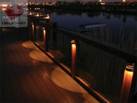 Side lights on railing posts cast a gentle and warm light along this upper deck waterfront property. Indirect illumination is subtle and with the right color creates the perfect atmosphere for a warm evening. Deck Stair Lights, Deck Post Lights, Outdoor Deck Lighting, Outdoor String Lights Patio, Best Outdoor Lighting, Backyard Trees, Led Deck Lighting, Deck Posts, Solar Deck Lights