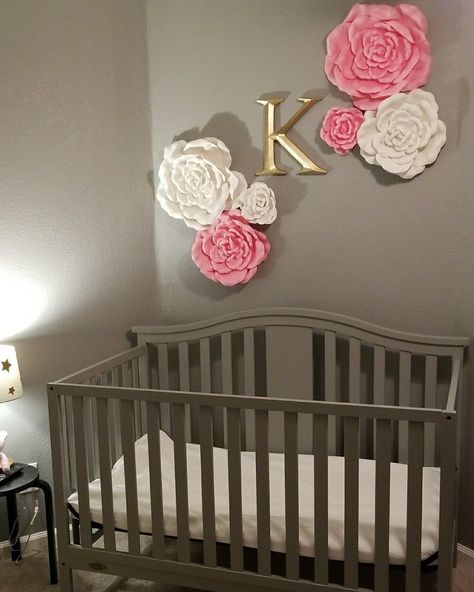 My nursery for my baby girl! Flowers and letter from hobby lobby. Girl Nursery Themes Flower, Hobby Lobby Nursery Girl, Hobby Lobby Baby Girl Nursery, Hobby Lobby Flower Wall Decor, Hobby Lobby Wall Flowers, Hobby Lobby Nursery, Hobby Lobby Flowers, Nursery Letters Girl, Flower And Butterfly Nursery Girl Rooms