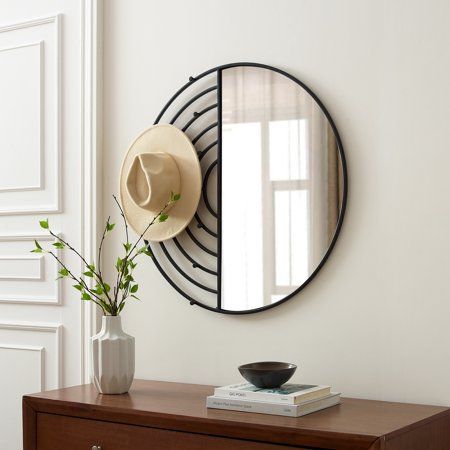 Add a touch of glamour and retro style with the Walker Edison 32 Contemporary Round Wall Mirror with Hooks. The half-circle mirror adds an eye-catching, artistic flair, while the metal hooks become a landing spot for accessories and keys. The stunning combination of contrasting metal and chic glass makes this mirror a focal point in any entryway, hallway, or mudroom. The versatile silhouette fits right at home in modern, contemporary, and bohemian aesthetics. Size: 32".  Color: Black. Black Circle Mirror With Shelf, Wall Mirror With Hooks, Big Round Mirror, Round Hanging Mirror, Mirror Hallway, Mirror Decor Ideas, Entryway Mirror, Mirror With Hooks, Circle Mirror