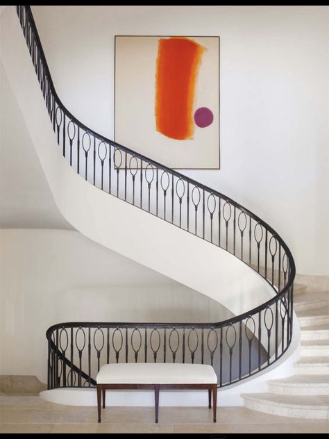 Sleek Parisian style iron railing paired with one vibrant piece of contemporary art Beautiful Stairs, Iron Stair Railing, Escalier Design, Real Estat, Stair Case, Lan Can, Stair Steps, Interior Stairs, Grand Staircase