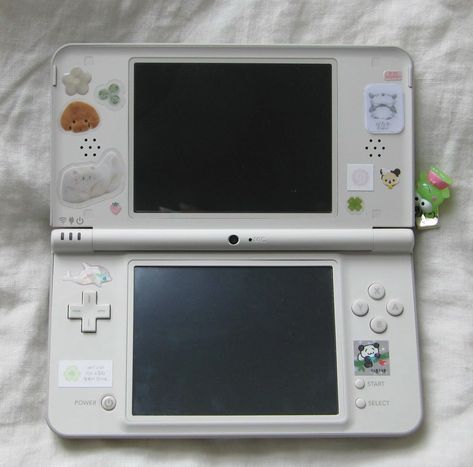 sticker mèo /ᐠ｡⋏｡ᐟ✿\ on Instagram: "DSi LL [creator] Nintendo [year] 2010 [type] handheld gaming console [info] my favorite gaming console ~ a pocketbook full of fun!" Vintage Game Console, Dsi Games, Pink 3ds, Old Nintendo, Handheld Console, Nintendo Dsi, Nintendo 3ds Xl, Desktop Setup, Dual Screen