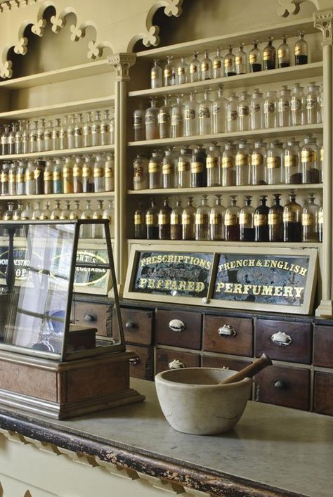 Apothecary Retail Design, Light Apothecary Aesthetic, Old World Apothecary, Apothecary Booth Display, Apothecary Window Display, Victorian Apothecary Aesthetic, Apothecary Cabinet Decor, Apothecary Shop Ideas, Old Pharmacy Aesthetic