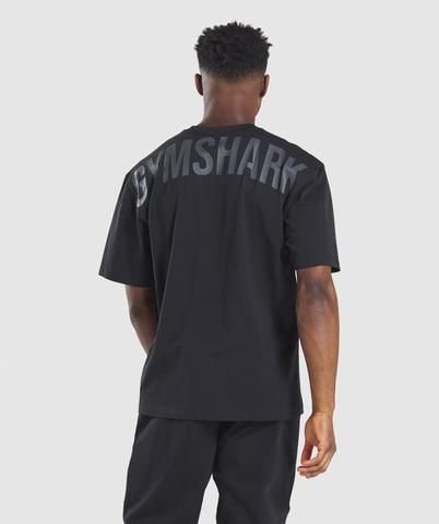 BUILT FOR BODYBUILDING   ⁃ Oversized fit  ⁃ Durable material  ⁃ Dropped shoulder  ⁃ Stretchy ribbed neck  ⁃ Straight hem  ⁃ Large screen-printed Gymshark logo to back  ⁃ Screen-printed Gymshark logo to front hem  ��⁃ 95% Cotton, 5% Elastane  ⁃ Model is 6’2” and wears size M  ⁃ Label Colour: Black  Taking lessons from the old school, the silhouette of the Power T-Shirt is as strong as the lifter who wears it. With an oversized fit and dropped shoulder that amplifies the upper body, this bodybuildin Gymshark Outfit, Gymshark Shirt, Gymshark Joggers, Oversized Shirt Men, Gymshark Men, Boxing Club, Gym Shark, Joggers Outfit, Gym Fits