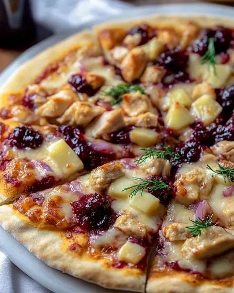 Indulge in a delightful Cranberry Chicken & Brie Pizza, featuring tender chicken, creamy brie, and sweet cranberry sauce on a crispy crust. Cranberry Chicken And Brie Pizza, Apple Cranberry Coleslaw, Brie Chicken, Feta And Honey, Cranberry Coleslaw, Chicken Brie, Brie Pizza, Potatoes With Feta, Specialty Pizza