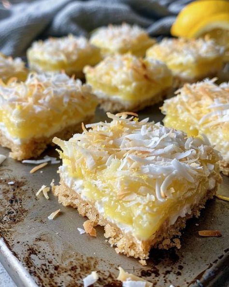 This recipe is a hit! My niece always snags the first one off the table. Definitely a crowd-pleaser. Cooktop Cove Recipes Dessert, Coconut Squares, Cooktop Cove, Dessert Squares, Lemon Cookie, Dream Bars, Citrus Recipes, Lemon Squares, Square Recipes